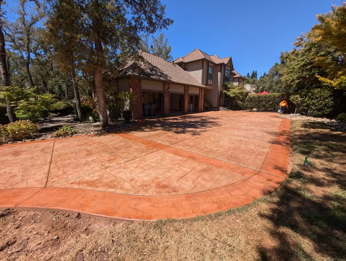 Finished residential concrete driveway installed by MG Concrete